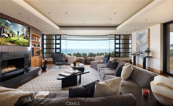 Fireplace, Interior, Living room, Recessed Lighting, Water, Wood Texture Flooring