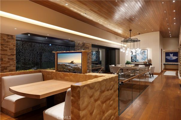 Dining room, Fireplace, Interior, Living room, Pendant Lights, Recessed Lighting, Stone Walls, Wooden Ceilings, Wood Texture Flooring