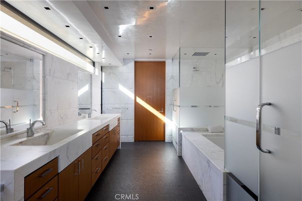 Bathroom, Dual Sink Vanities, Glass Shower, Interior, Marble Walls, Recessed Lighting