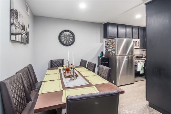 Dining room, Interior, Kitchen, Recessed Lighting, Stainless Steel Appliances, Wood Texture Flooring