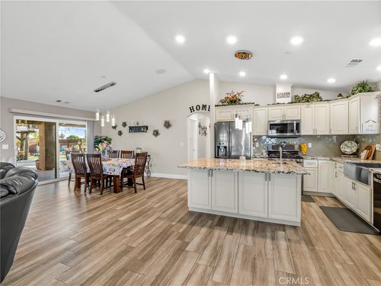 Dining room, Interior, Kitchen, Pendant Lights, Recessed Lighting, Stainless Steel Appliances, Wood Texture Flooring
