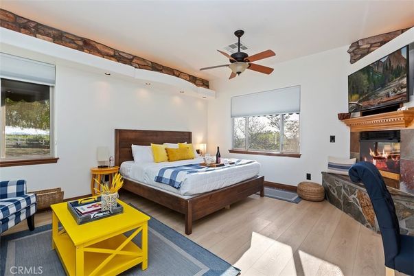 Bedroom, Fireplace, Interior, Recessed Lighting, Wood Texture Flooring