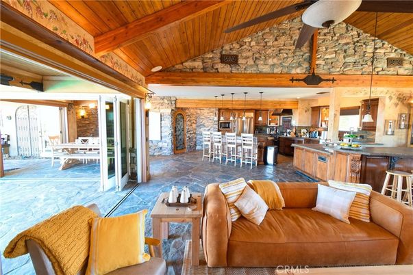 Dining room, Interior, Kitchen, Living room, Pendant Lights, Stainless Steel Appliances, Stone Walls, Wooden Beams, Wooden Ceilings