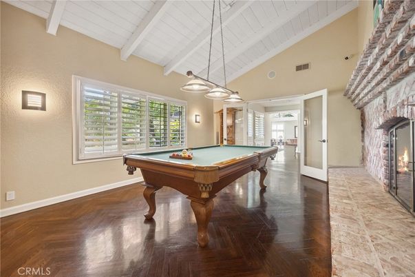 Billiard Table, Fireplace, Game Room, Interior, Pendant Lights, Wood Texture Flooring