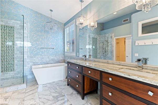Bathroom, Chandelier, Dual Sink Vanities, Free Standing Baths, Glass Shower, Interior, Marble, Pendant Lights, Recessed Lighting