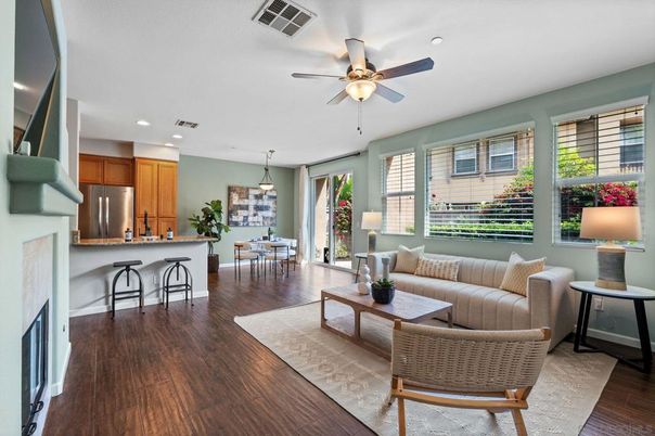 Dining room, Fireplace, Interior, Kitchen, Living room, Pendant Lights, Recessed Lighting, Stainless Steel Appliances, Wood Texture Flooring
