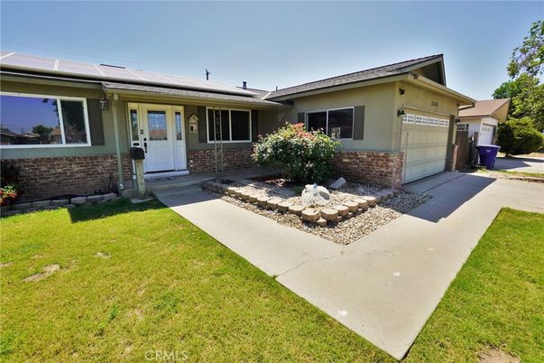 Attached, Exterior, Facade, Brick Facade, Solar Panels, Ranch