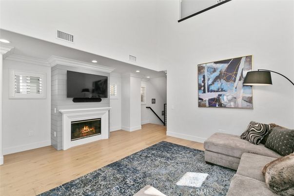Fireplace, Interior, Living room, Recessed Lighting, Wood Texture Flooring