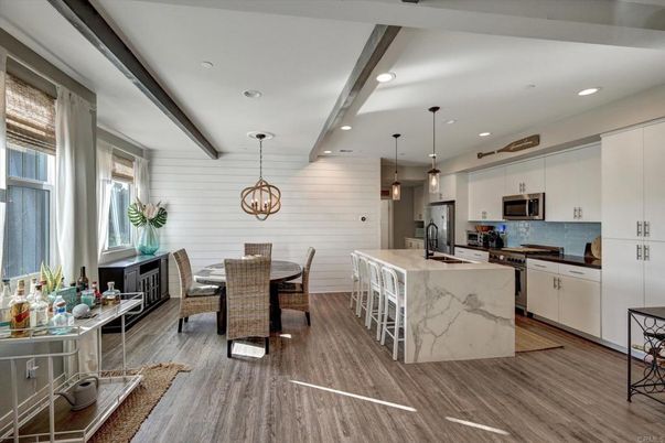 Dining room, Interior, Kitchen, Pendant Lights, Recessed Lighting, Stainless Steel Appliances, Wooden Beams, Wood Texture Flooring