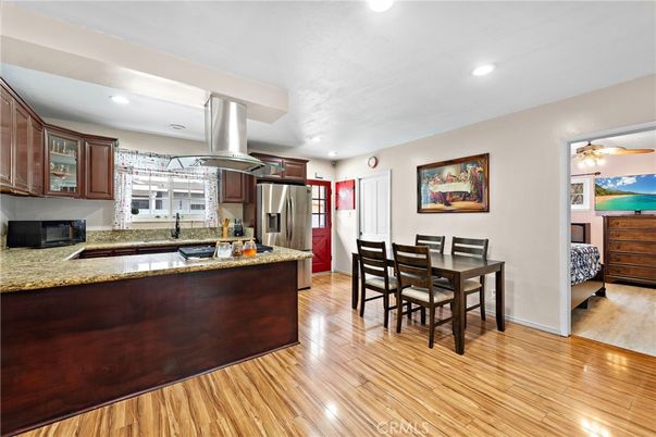 Dining room, Interior, Kitchen, Recessed Lighting, Stainless Steel Appliances, Wood Texture Flooring