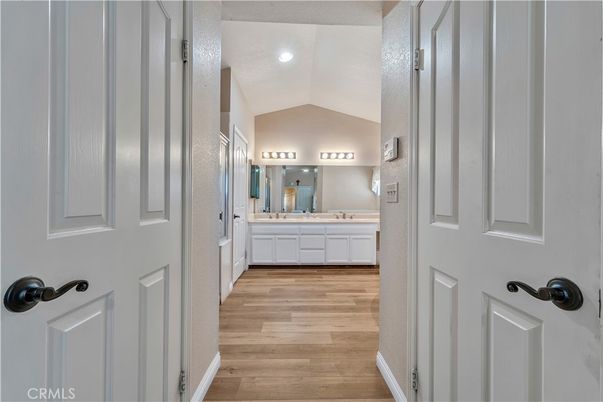 Bathroom, Dual Sink Vanities, Interior, Recessed Lighting, Wood Texture Flooring