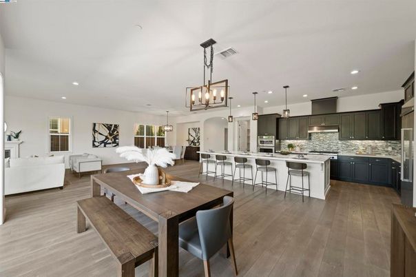 Dining room, Interior, Kitchen, Living room, Pendant Lights, Recessed Lighting, Stainless Steel Appliances, Wood Texture Flooring