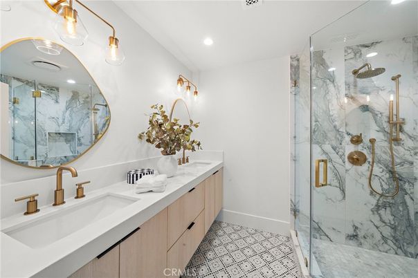 Bathroom, Dual Sink Vanities, Glass Shower, Interior, Marble Walls, Recessed Lighting