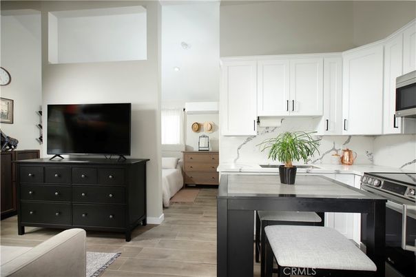 Interior, Kitchen, Marble Walls, Stainless Steel Appliances, Wood Texture Flooring