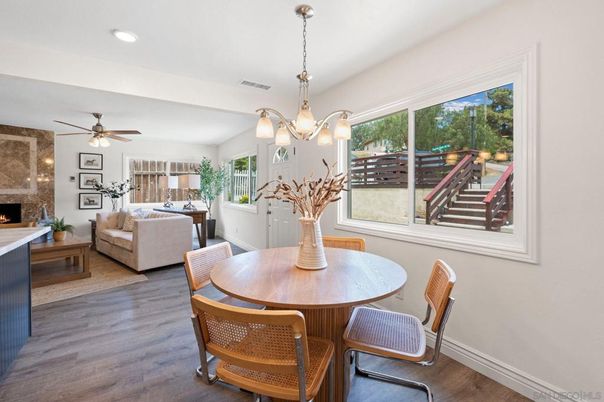 Dining room, Fireplace, Interior, Living room, Pendant Lights, Recessed Lighting, Stone Walls, Wood Texture Flooring
