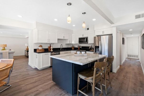 Interior, Kitchen, Pendant Lights, Recessed Lighting, Stainless Steel Appliances, Wood Texture Flooring
