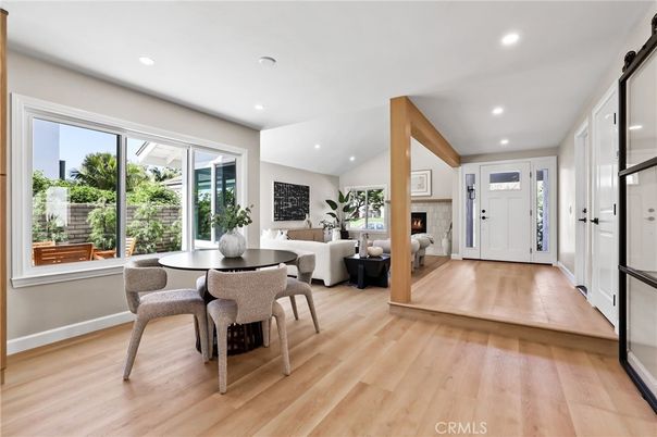 Dining room, Fireplace, Interior, Living room, Recessed Lighting, Wood Texture Flooring