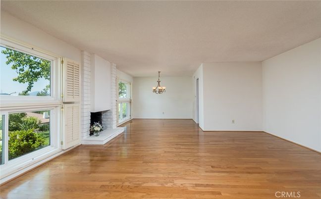 Chandelier, Empty room, Fireplace, Interior, Wood Texture Flooring
