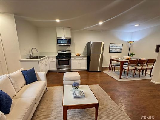 Dining room, Interior, Kitchen, Living room, Recessed Lighting, Stainless Steel Appliances, Wood Texture Flooring