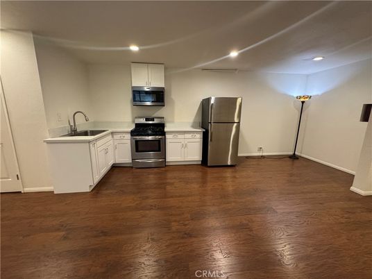 Interior, Kitchen, Recessed Lighting, Stainless Steel Appliances, Wood Texture Flooring