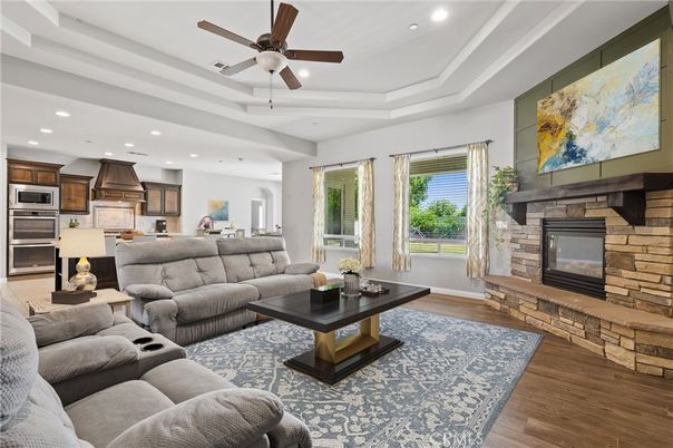 Fireplace, Interior, Kitchen, Living room, Recessed Lighting, Stainless Steel Appliances, Stone Walls, Wood Texture Flooring