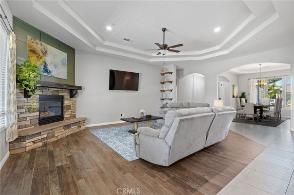 Chandelier, Dining room, Fireplace, Interior, Living room, Recessed Lighting, Wood Texture Flooring