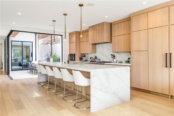 Interior, Kitchen, Marble Walls, Pendant Lights, Recessed Lighting, Wood Texture Flooring