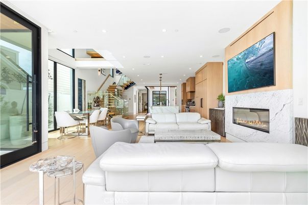 Dining room, Fireplace, Interior, Living room, Pendant Lights, Recessed Lighting, Wood Texture Flooring