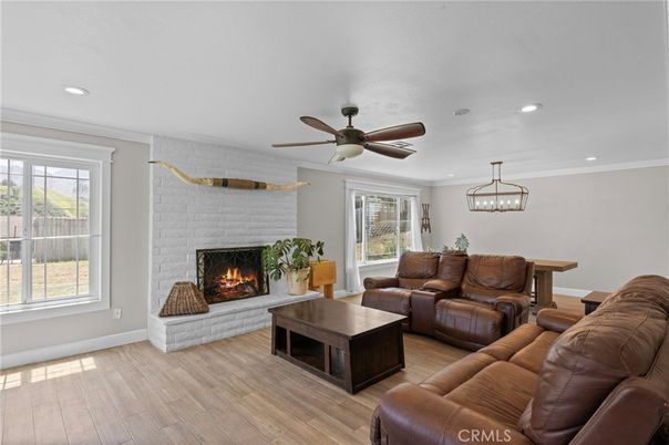 Chandelier, Dining room, Fireplace, Interior, Living room, Recessed Lighting, Wood Texture Flooring