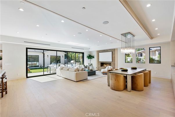 Dining room, Fireplace, Interior, Living room, Pendant Lights, Recessed Lighting, Wood Texture Flooring