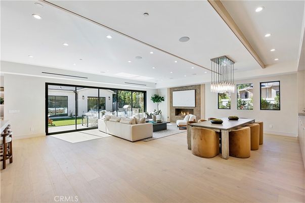 Dining room, Fireplace, Interior, Living room, Pendant Lights, Recessed Lighting, Wood Texture Flooring