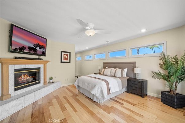 Bedroom, Fireplace, Interior, Recessed Lighting, Wood Texture Flooring