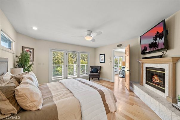 Bedroom, Fireplace, Interior, Recessed Lighting, Wood Texture Flooring