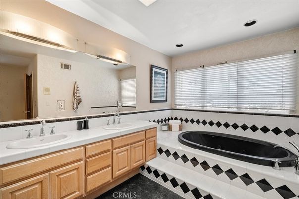 Bathroom, Dual Sink Vanities, Interior, Recessed Lighting, Tile Countertops