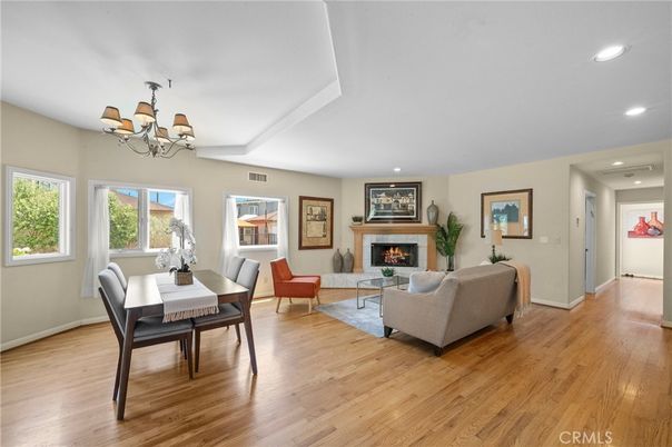 Chandelier, Dining room, Fireplace, Interior, Living room, Recessed Lighting, Wood Texture Flooring