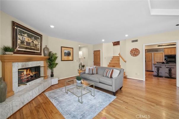 Fireplace, Interior, Living room, Recessed Lighting, Wood Texture Flooring