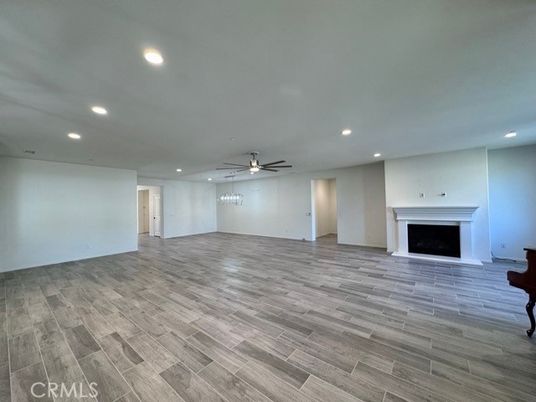 Empty room, Fireplace, Interior, Recessed Lighting, Wood Texture Flooring