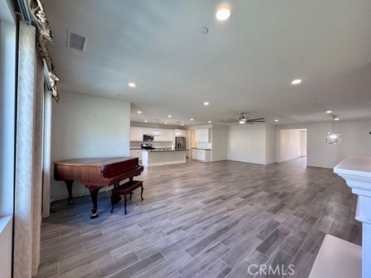 Interior, Kitchen, Pendant Lights, Piano, Recessed Lighting, Stainless Steel Appliances, Wood Texture Flooring