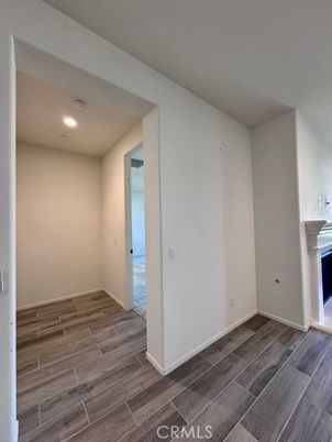 Empty room, Fireplace, Interior, Recessed Lighting, Wood Texture Flooring