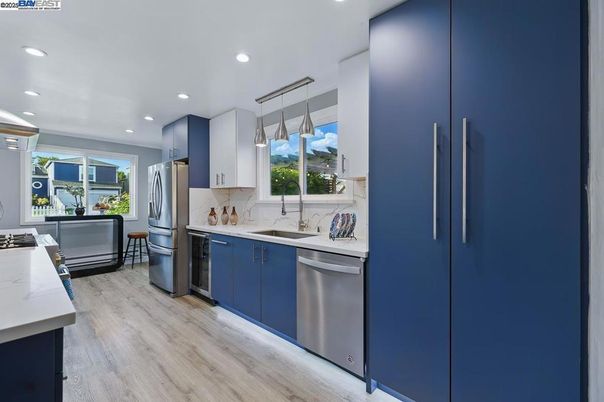 Interior, Kitchen, Pendant Lights, Recessed Lighting, Stainless Steel Appliances, Wood Texture Flooring