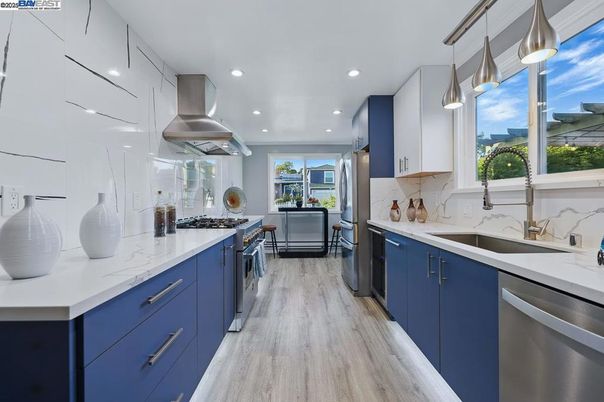 Interior, Kitchen, Pendant Lights, Recessed Lighting, Stainless Steel Appliances, Wood Texture Flooring