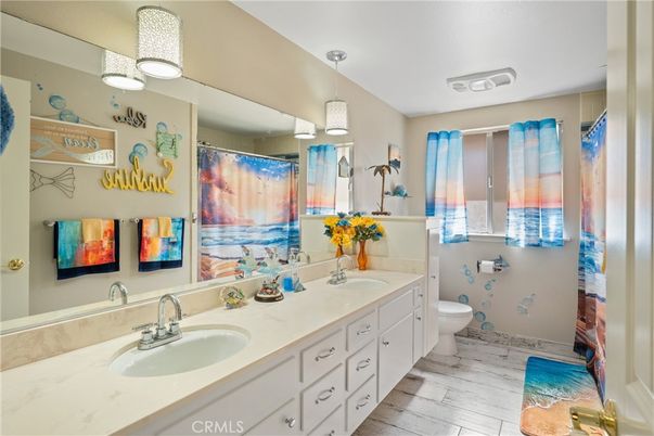 Bathroom, Dual Sink Vanities, Interior, Pendant Lights, Wood Texture Flooring