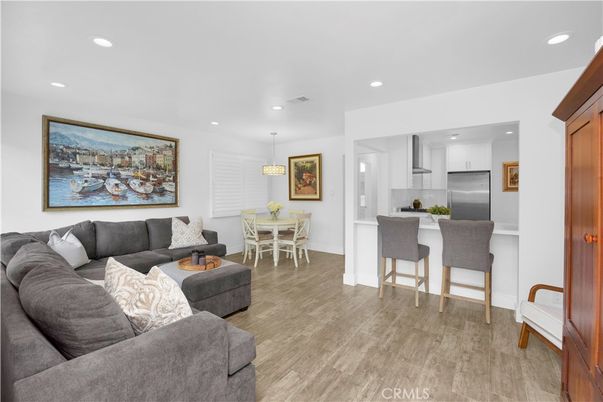 Dining room, Interior, Kitchen, Living room, Pendant Lights, Recessed Lighting, Stainless Steel Appliances, Wood Texture Flooring
