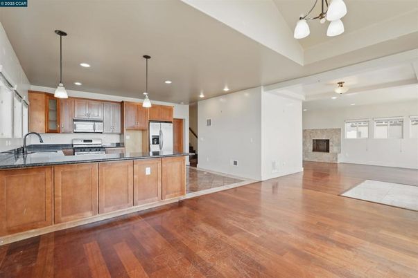 Interior, Kitchen, Pendant Lights, Recessed Lighting, Stainless Steel Appliances, Wood Texture Flooring