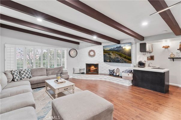 Fireplace, Interior, Living room, Recessed Lighting, Stone Walls, Wooden Beams, Wood Texture Flooring