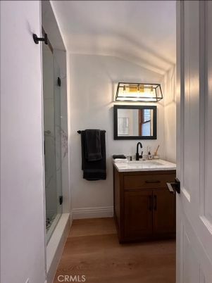 Bathroom, Glass Shower, Interior, Marble Walls, Wood Texture Flooring
