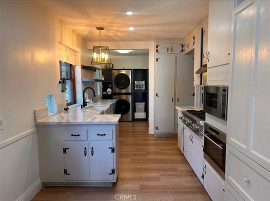 Interior, Kitchen, Pendant Lights, Recessed Lighting, Stainless Steel Appliances, Wood Texture Flooring