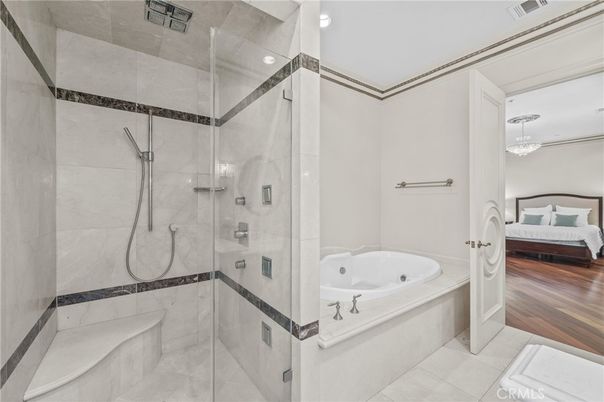 Bathroom, Bedroom, Chandelier, Glass Shower, Interior, Recessed Lighting, Wood Texture Flooring