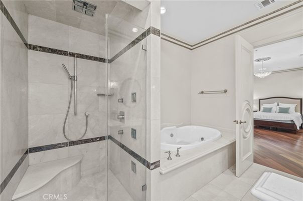 Bathroom, Bedroom, Chandelier, Glass Shower, Interior, Recessed Lighting, Wood Texture Flooring