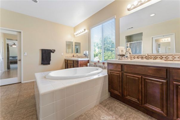Bathroom, Dual Sink Vanities, Interior, Recessed Lighting, Tile Countertops